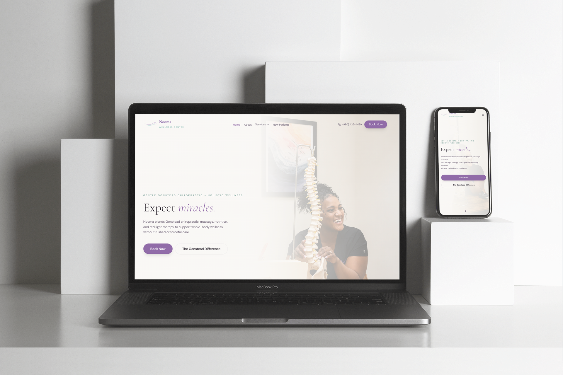 Nooma live website shown on MacBook and iPhone