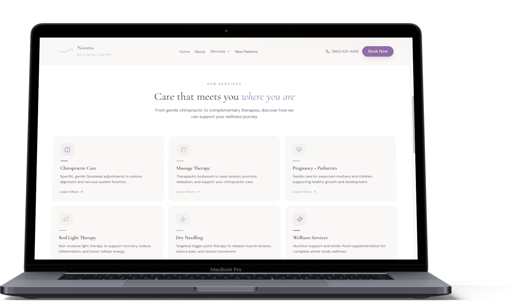 Redesigned Nooma Wellness website shown on a laptop